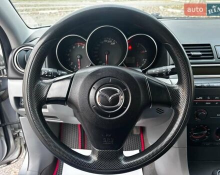Сірий Мазда 3, об'ємом двигуна 1.4 л та пробігом 198 тис. км за 5490 $, фото 24 на Automoto.ua