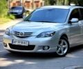 Сірий Мазда 3, об'ємом двигуна 2 л та пробігом 191 тис. км за 3999 $, фото 1 на Automoto.ua
