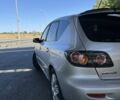 Серый Мазда 3, объемом двигателя 1.3 л и пробегом 282 тыс. км за 3800 $, фото 4 на Automoto.ua
