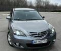 Сірий Мазда 3, об'ємом двигуна 1.6 л та пробігом 248 тис. км за 4700 $, фото 4 на Automoto.ua