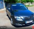 Серый Мазда 3, объемом двигателя 1.6 л и пробегом 265 тыс. км за 3200 $, фото 1 на Automoto.ua