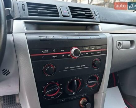 Сірий Мазда 3, об'ємом двигуна 1.4 л та пробігом 198 тис. км за 5490 $, фото 20 на Automoto.ua