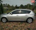 Сірий Мазда 3, об'ємом двигуна 2 л та пробігом 184 тис. км за 4200 $, фото 1 на Automoto.ua