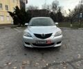 Сірий Мазда 3, об'ємом двигуна 1.4 л та пробігом 198 тис. км за 5490 $, фото 1 на Automoto.ua