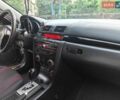 Серый Мазда 3, объемом двигателя 1.6 л и пробегом 270 тыс. км за 4100 $, фото 13 на Automoto.ua