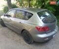 Серый Мазда 3, объемом двигателя 1.4 л и пробегом 220 тыс. км за 4300 $, фото 1 на Automoto.ua