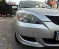 Сірий Мазда 3, об'ємом двигуна 1.4 л та пробігом 198 тис. км за 5490 $, фото 8 на Automoto.ua