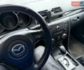 Сірий Мазда 3, об'ємом двигуна 1.6 л та пробігом 294 тис. км за 4050 $, фото 4 на Automoto.ua