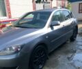 Серый Мазда 3, объемом двигателя 1.6 л и пробегом 250 тыс. км за 6100 $, фото 1 на Automoto.ua