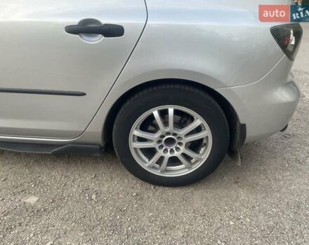 Серый Мазда 3, объемом двигателя 1.3 л и пробегом 221 тыс. км за 4999 $, фото 1 на Automoto.ua