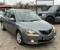 Серый Мазда 3, объемом двигателя 1.6 л и пробегом 243 тыс. км за 3950 $, фото 1 на Automoto.ua
