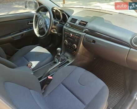 Серый Мазда 3, объемом двигателя 1.6 л и пробегом 146 тыс. км за 4850 $, фото 11 на Automoto.ua