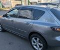 Сірий Мазда 3, об'ємом двигуна 1.6 л та пробігом 290 тис. км за 3012 $, фото 1 на Automoto.ua