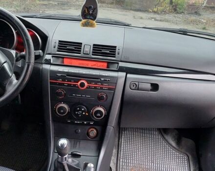 Серый Мазда 3, объемом двигателя 1.6 л и пробегом 270 тыс. км за 1999 $, фото 3 на Automoto.ua