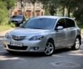 Серый Мазда 3, объемом двигателя 2 л и пробегом 192 тыс. км за 3900 $, фото 1 на Automoto.ua