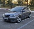 Серый Мазда 3, объемом двигателя 1.6 л и пробегом 235 тыс. км за 4999 $, фото 1 на Automoto.ua
