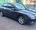 Серый Мазда 3, объемом двигателя 1.6 л и пробегом 265 тыс. км за 3200 $, фото 1 на Automoto.ua