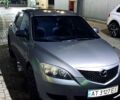 Сірий Мазда 3, об'ємом двигуна 1.3 л та пробігом 305 тис. км за 3600 $, фото 1 на Automoto.ua