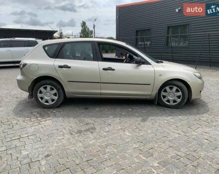 Серый Мазда 3, объемом двигателя 1.3 л и пробегом 240 тыс. км за 4100 $, фото 4 на Automoto.ua