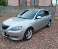 Серый Мазда 3, объемом двигателя 1.6 л и пробегом 225 тыс. км за 3850 $, фото 1 на Automoto.ua