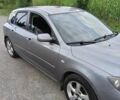 Серый Мазда 3, объемом двигателя 1.6 л и пробегом 296 тыс. км за 3588 $, фото 2 на Automoto.ua