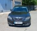 Серый Мазда 3, объемом двигателя 1.6 л и пробегом 265 тыс. км за 3205 $, фото 1 на Automoto.ua