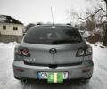 Серый Мазда 3, объемом двигателя 2 л и пробегом 290 тыс. км за 4999 $, фото 2 на Automoto.ua
