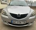 Серый Мазда 3, объемом двигателя 2 л и пробегом 240 тыс. км за 4700 $, фото 1 на Automoto.ua