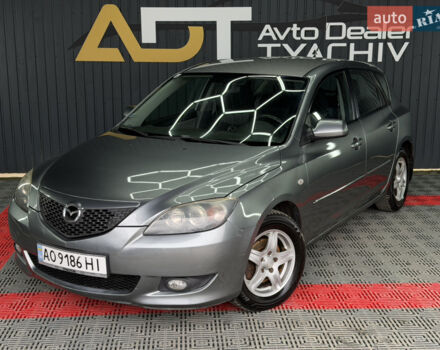 Серый Мазда 3, объемом двигателя 1.6 л и пробегом 301 тыс. км за 3400 $, фото 7 на Automoto.ua