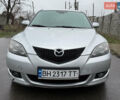 Сірий Мазда 3, об'ємом двигуна 1.4 л та пробігом 284 тис. км за 4150 $, фото 2 на Automoto.ua