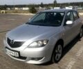 Серый Мазда 3, объемом двигателя 1.3 л и пробегом 235 тыс. км за 3400 $, фото 1 на Automoto.ua