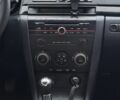 Сірий Мазда 3, об'ємом двигуна 1.6 л та пробігом 275 тис. км за 4300 $, фото 4 на Automoto.ua