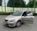Серый Мазда 3, объемом двигателя 1.3 л и пробегом 240 тыс. км за 4100 $, фото 1 на Automoto.ua