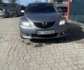 Серый Мазда 3, объемом двигателя 1.6 л и пробегом 347 тыс. км за 4200 $, фото 1 на Automoto.ua