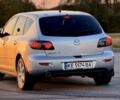 Серый Мазда 3, объемом двигателя 1.6 л и пробегом 170 тыс. км за 4014 $, фото 5 на Automoto.ua