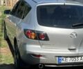 Сірий Мазда 3, об'ємом двигуна 2 л та пробігом 300 тис. км за 3502 $, фото 3 на Automoto.ua