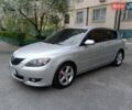 Серый Мазда 3, объемом двигателя 1.6 л и пробегом 350 тыс. км за 4200 $, фото 1 на Automoto.ua