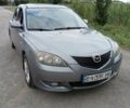 Серый Мазда 3, объемом двигателя 1.6 л и пробегом 296 тыс. км за 3588 $, фото 1 на Automoto.ua