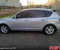 Серый Мазда 3, объемом двигателя 2 л и пробегом 320 тыс. км за 5300 $, фото 1 на Automoto.ua