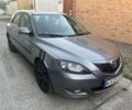 Серый Мазда 3, объемом двигателя 1.6 л и пробегом 309 тыс. км за 2912 $, фото 1 на Automoto.ua