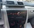 Сірий Мазда 3, об'ємом двигуна 1.4 л та пробігом 198 тис. км за 5490 $, фото 20 на Automoto.ua