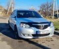 Серый Мазда 3, объемом двигателя 2 л и пробегом 245 тыс. км за 4200 $, фото 1 на Automoto.ua