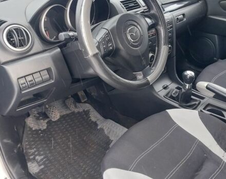 Серый Мазда 3, объемом двигателя 1.6 л и пробегом 237 тыс. км за 1100 $, фото 6 на Automoto.ua