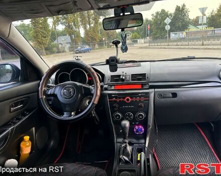 Сірий Мазда 3, об'ємом двигуна 2 л та пробігом 411 тис. км за 4200 $, фото 10 на Automoto.ua