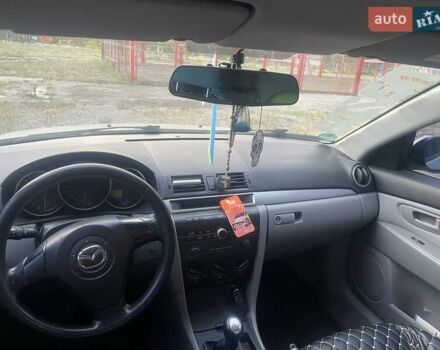 Серый Мазда 3, объемом двигателя 1.3 л и пробегом 221 тыс. км за 4999 $, фото 5 на Automoto.ua