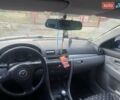 Серый Мазда 3, объемом двигателя 1.4 л и пробегом 221 тыс. км за 4999 $, фото 5 на Automoto.ua