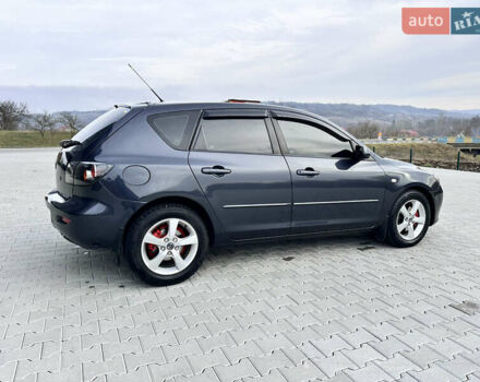 Сірий Мазда 3, об'ємом двигуна 1.6 л та пробігом 300 тис. км за 4500 $, фото 7 на Automoto.ua