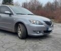Серый Мазда 3, объемом двигателя 1.6 л и пробегом 270 тыс. км за 1999 $, фото 1 на Automoto.ua