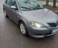 Серый Мазда 3, объемом двигателя 1.6 л и пробегом 286 тыс. км за 5500 $, фото 1 на Automoto.ua