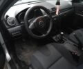 Серый Мазда 3, объемом двигателя 1.6 л и пробегом 206 тыс. км за 3950 $, фото 2 на Automoto.ua